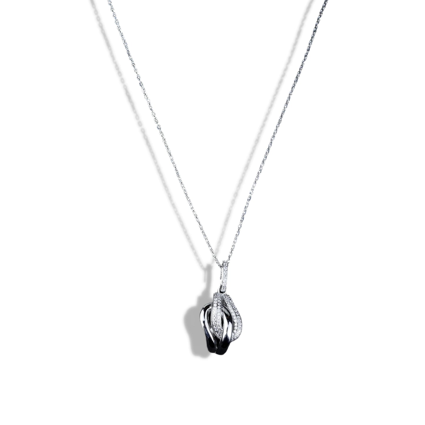 Silver necklace with a pendant on a white background