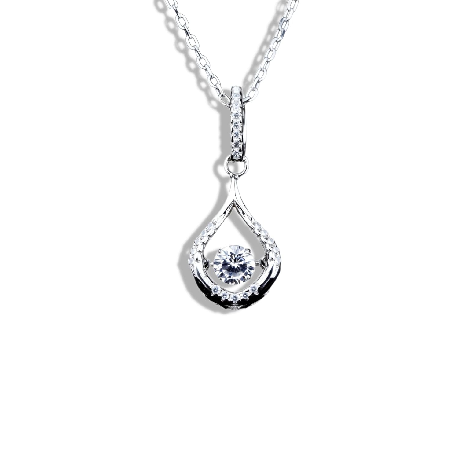 Teardrop-shaped diamond pendant on a white background