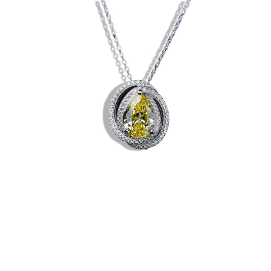 Diamond necklace with a yellow pear-shaped gemstone on a white background