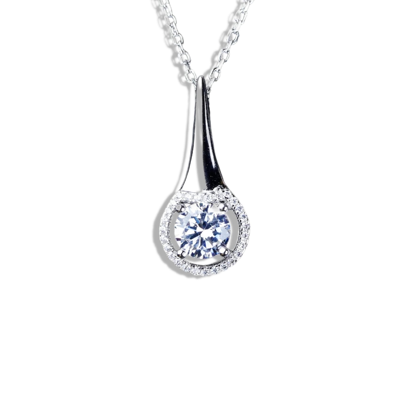 Silver teardrop pendant with a clear gemstone on a white background
