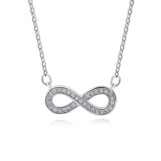 A sterling silver infinity pendant necklace with cubic zirconia stones, rhodium plating, on a white background.