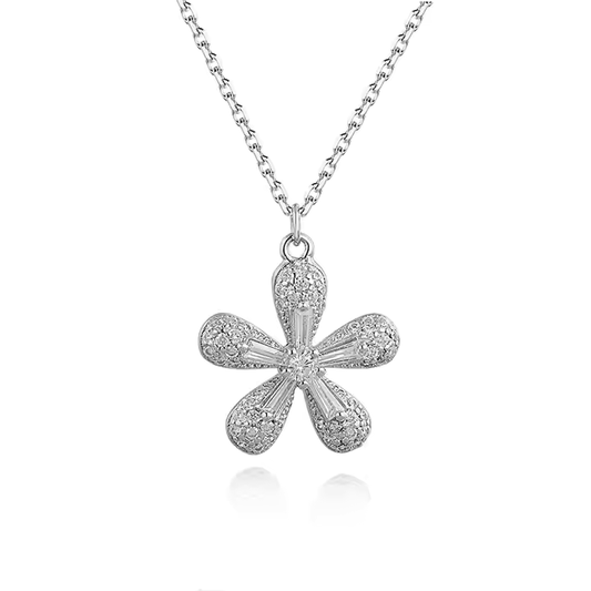 A silver necklace with a floral pendant, featuring a five-petal design, adorned with cubic zirconia.