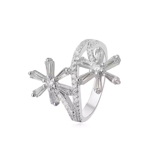 A sterling silver ring with a dual lily design, featuring cubic zirconia stones and a rhodium plating.