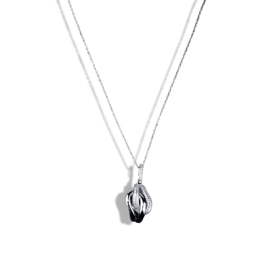 Silver necklace with a pendant on a white background