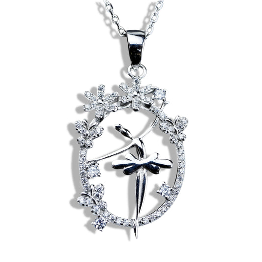 Silver pendant with floral design and black bow on a white background